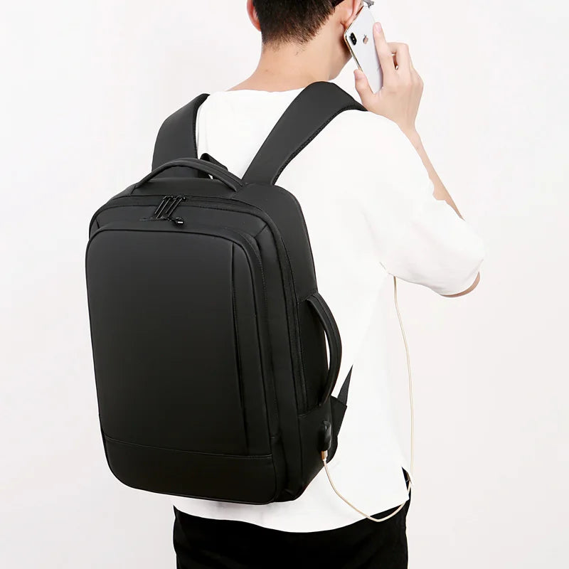 Expandable Travel Backpack with Boxy Shape and Multiple Carrying Positions
