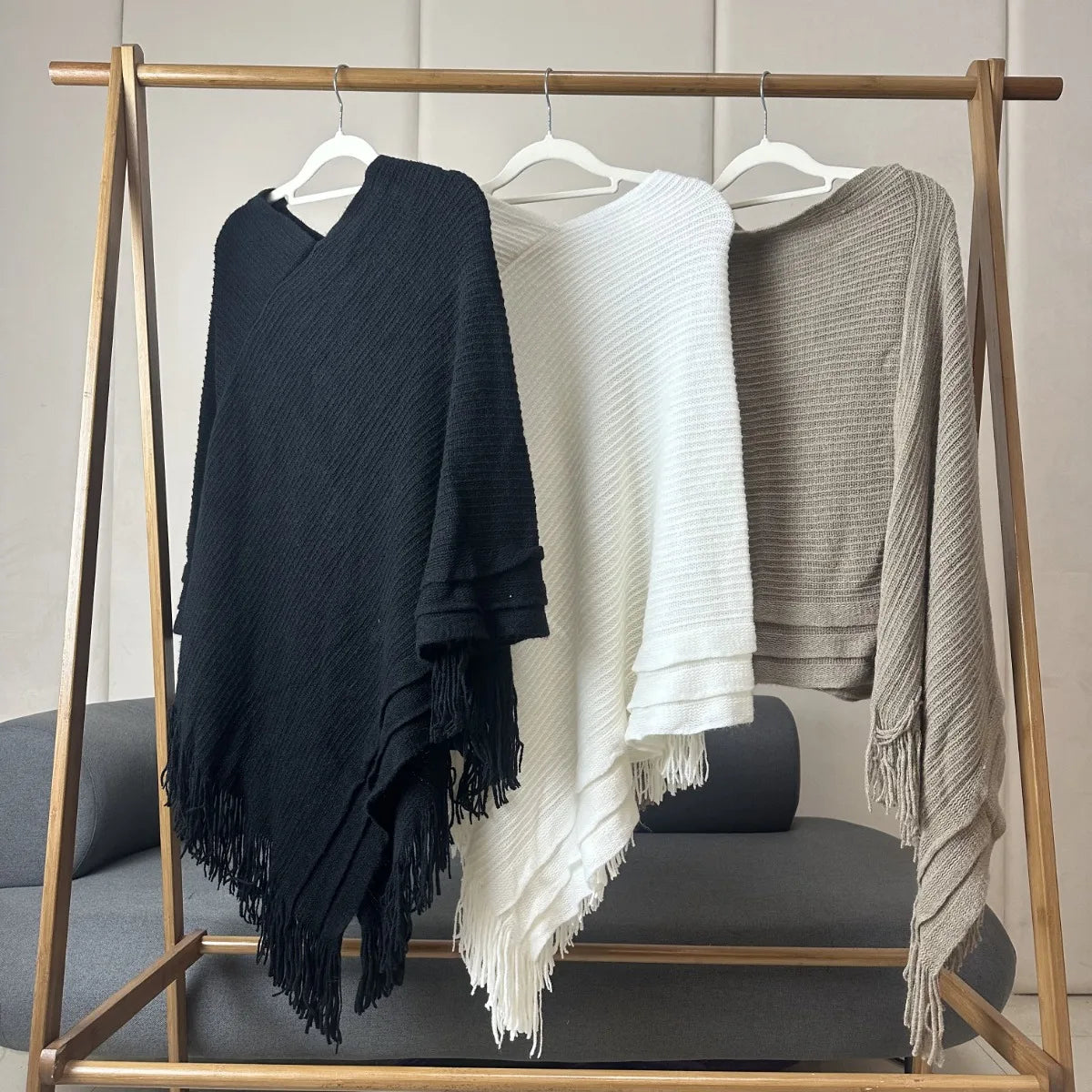 Knit Fringe Hem Poncho for Layering over Outfits