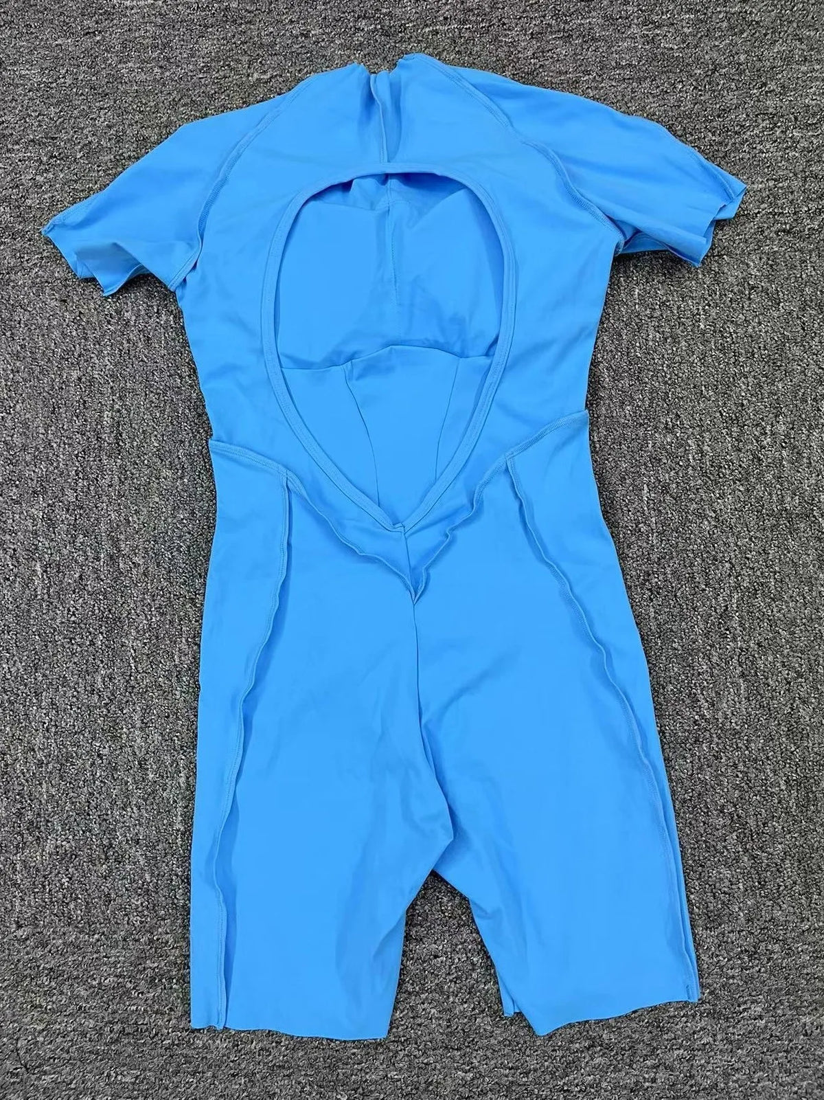 Women's Panelled Short Sleeve Workout Romper with a Rounded Back Cutout