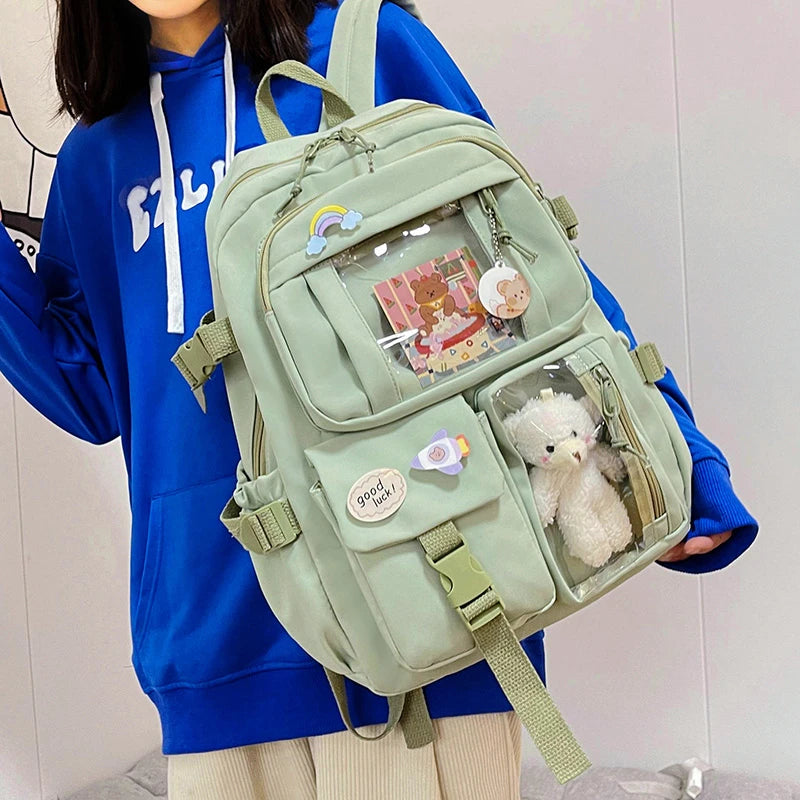 Multi-Pocket Student Backpack with Transparent Display Panels and Side Strap Details