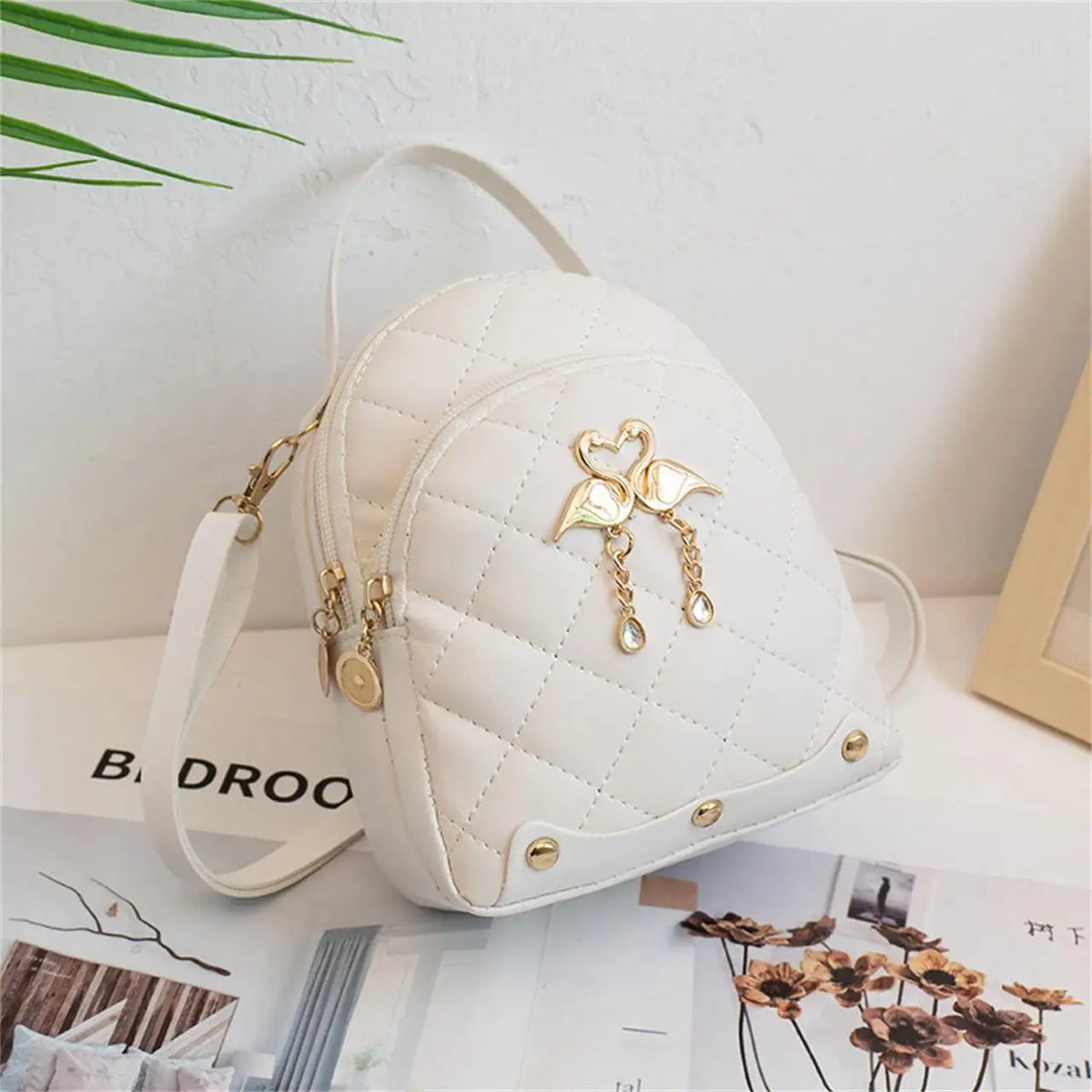 Women's Quilted Mini Backpack with Bow Detail and Top Carry Handle