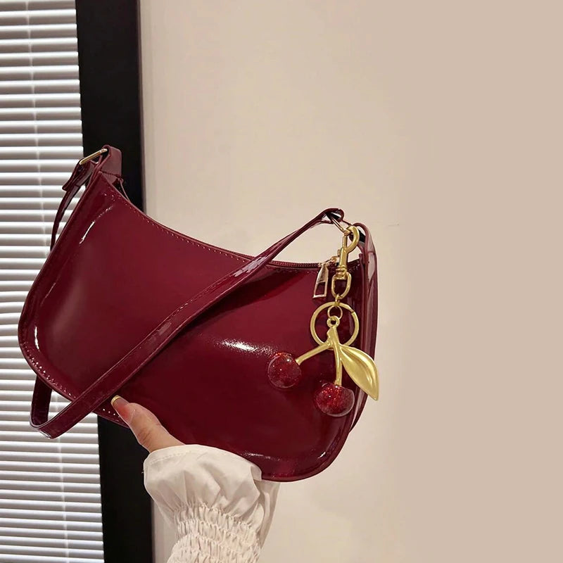 Solid Shoulder Handbag with Decorative Cherry Pendant Detail