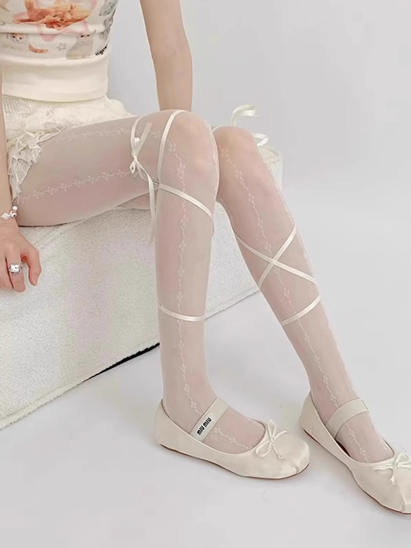 Sheer Lace Up Stockings with Decorative Ribbon Tie Details