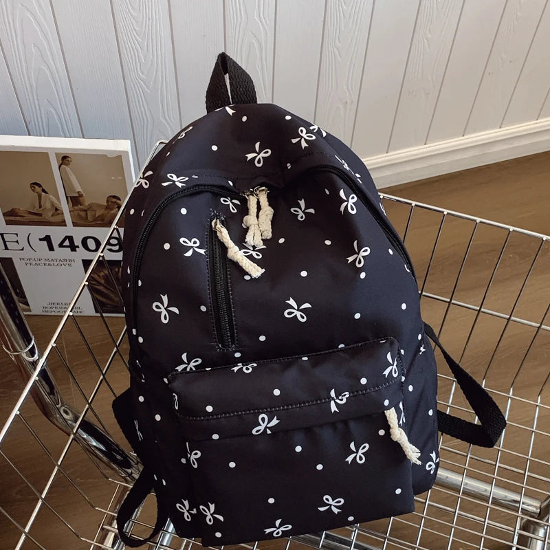 Women's Quilted Bow Print Backpack with Front Pocket and Shoulder Straps