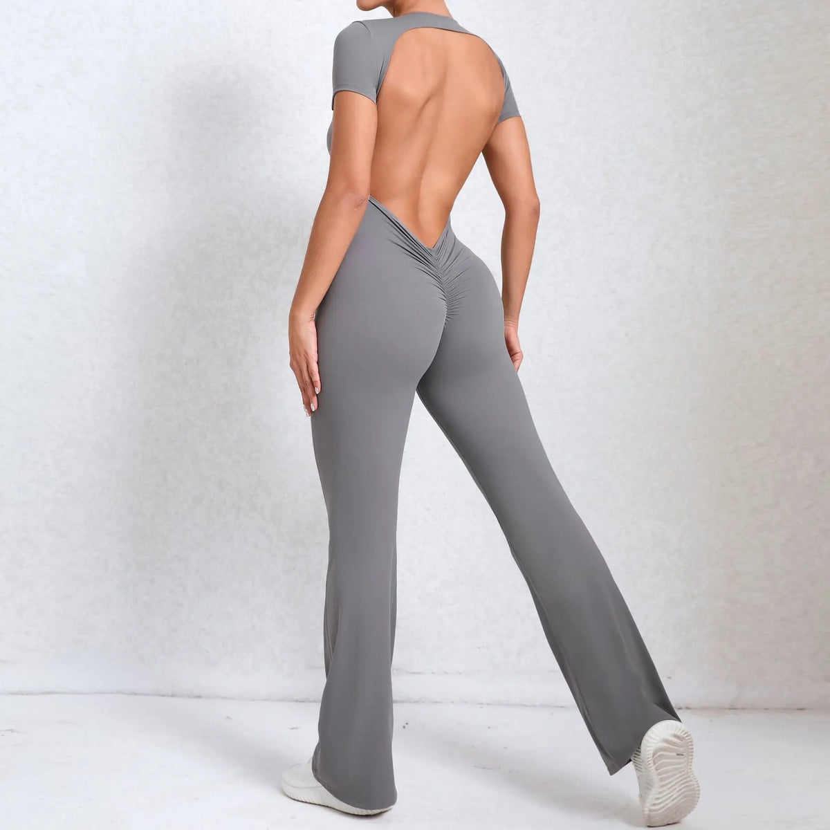 Women's Long Sleeve Nylon Blend Workout Jumpsuit with Open Back