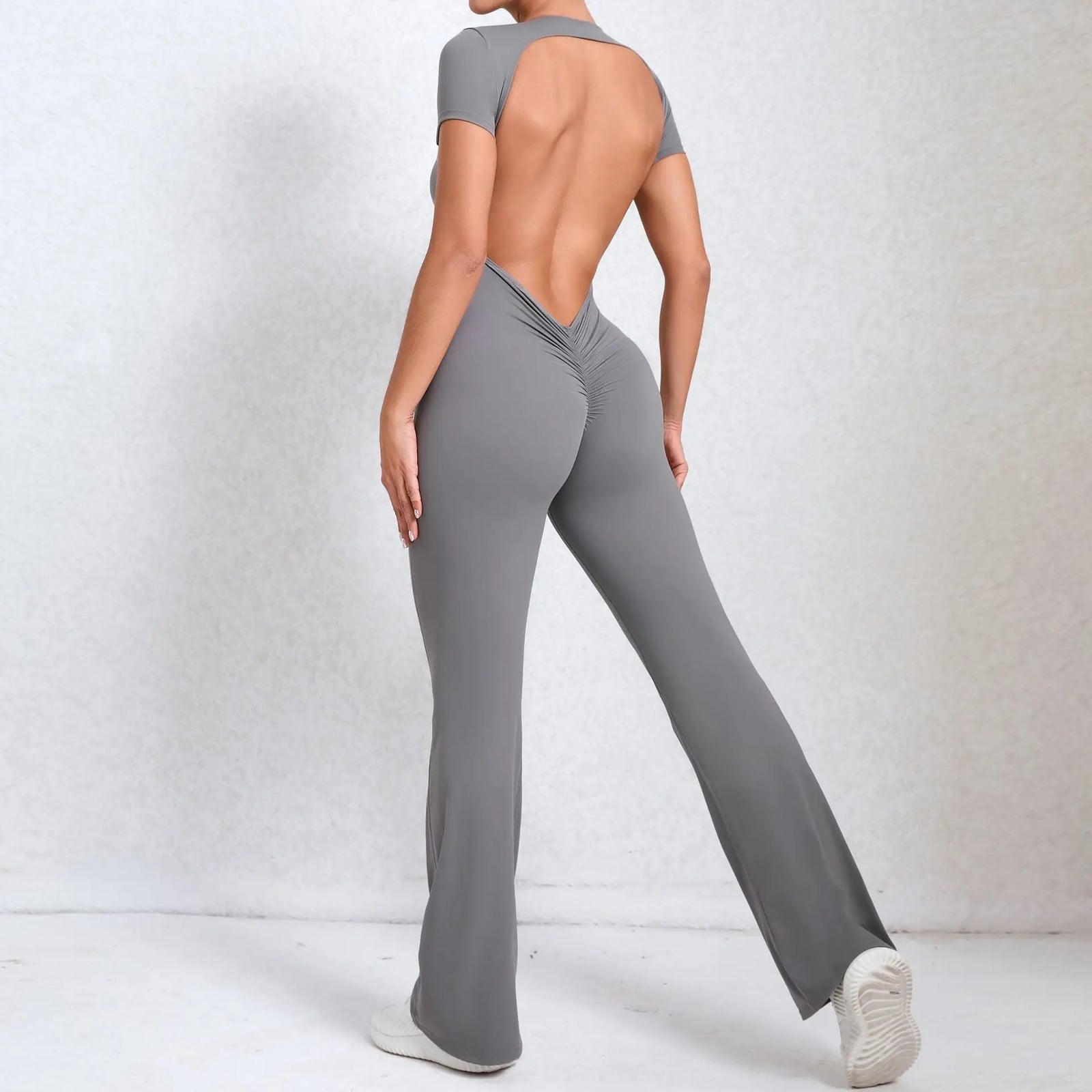 Women's Long Sleeve Nylon Blend Workout Jumpsuit with Open Back