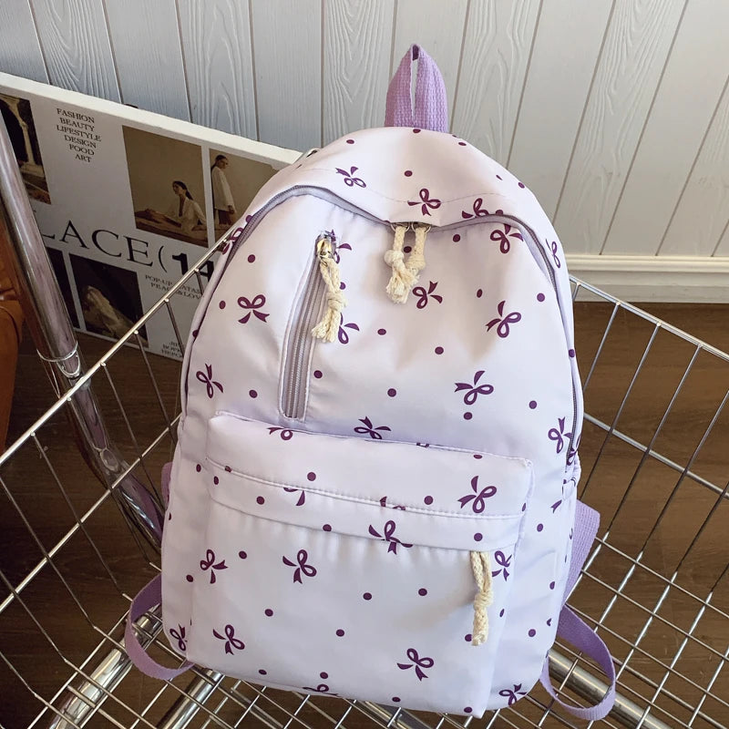 Women's Quilted Bow Print Backpack with Front Pocket and Shoulder Straps