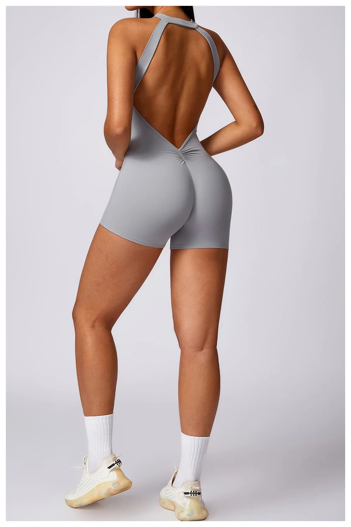 Women's High Neck Nylon Blend Romper with an Open Back
