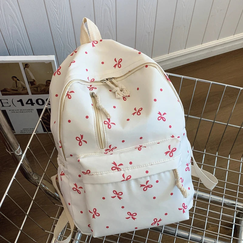 Women's Quilted Bow Print Backpack with Front Pocket and Shoulder Straps