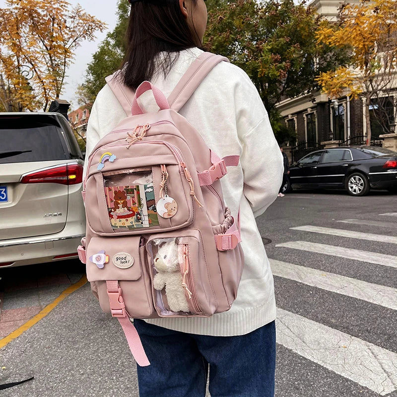 Multi-Pocket Student Backpack with Transparent Display Panels and Side Strap Details