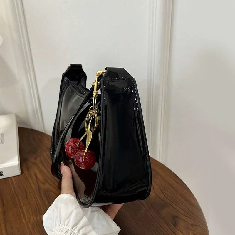 Solid Shoulder Handbag with Decorative Cherry Pendant Detail