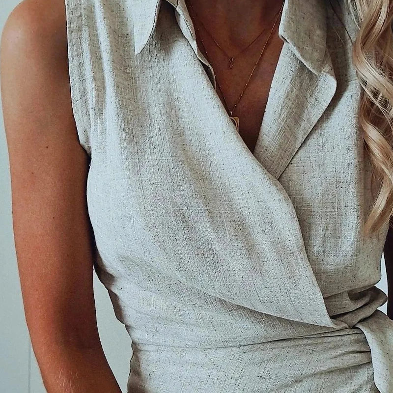 Women's Sleeveless Collared Mini Dress with Waist Tie and Asymmetrical Wrap Hem