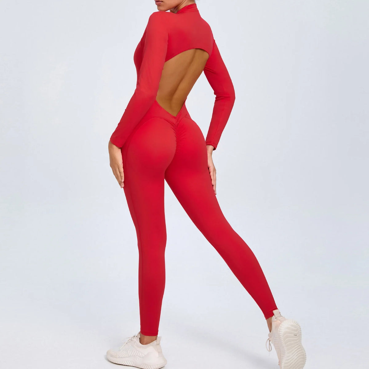 Women's Long Sleeve Nylon Blend Workout Jumpsuit with Zip and Back Cutout