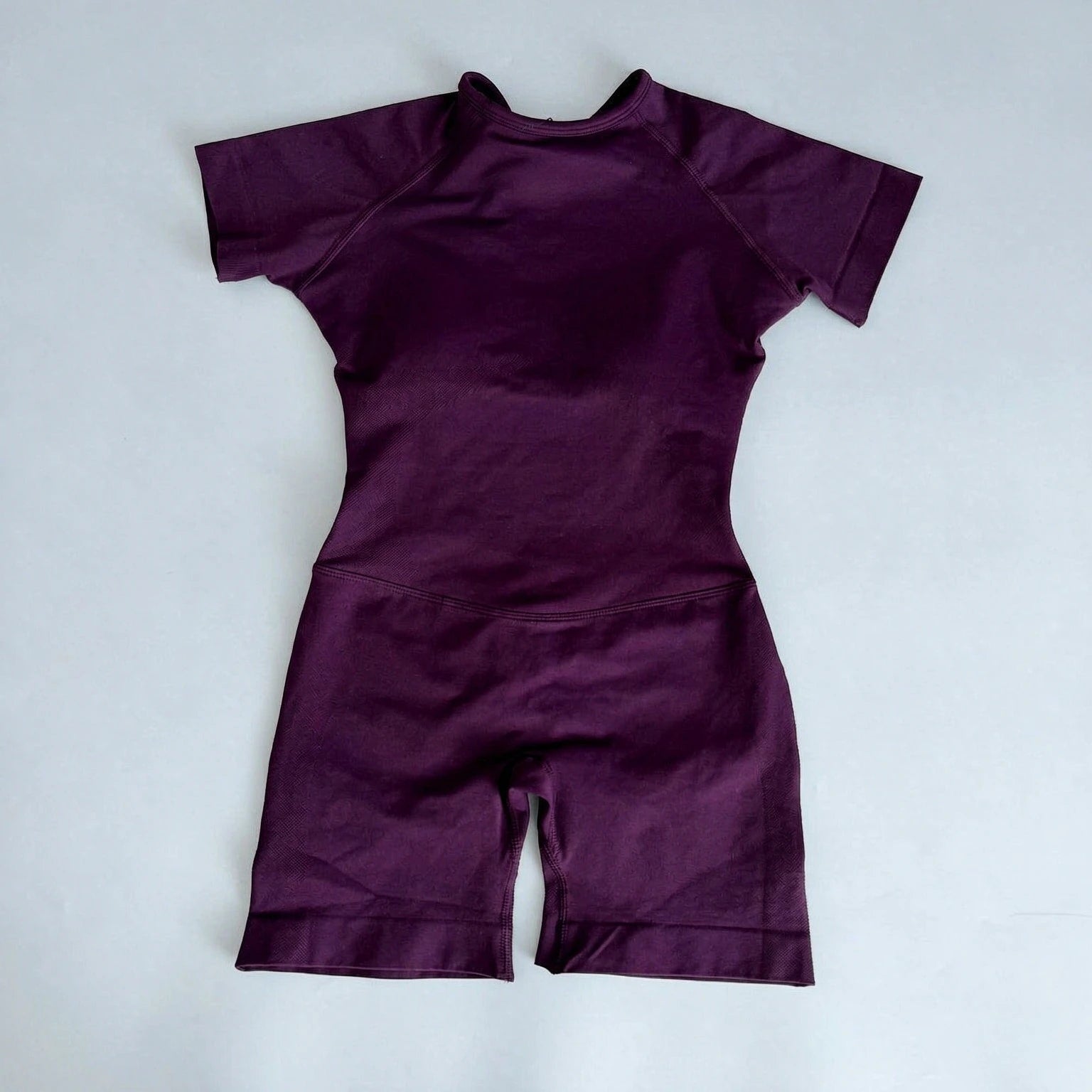 Women's Short Sleeve Polyester Blend Workout Romper with Open Back