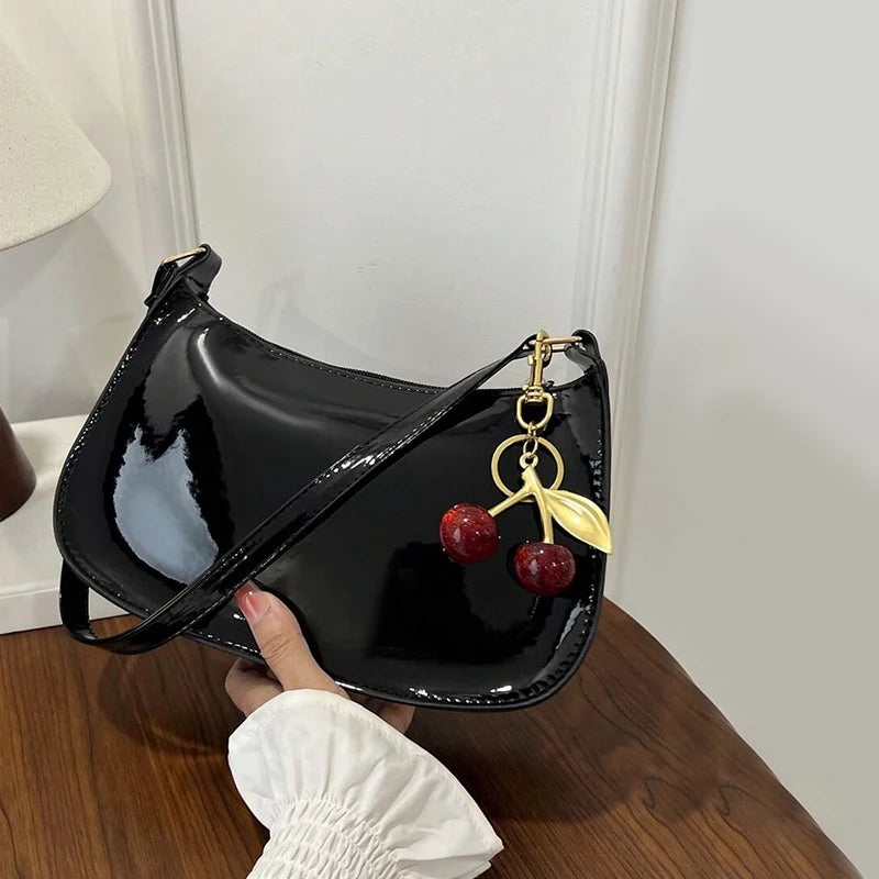 Solid Shoulder Handbag with Decorative Cherry Pendant Detail