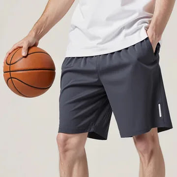 Navy shorts shown with a basketball
